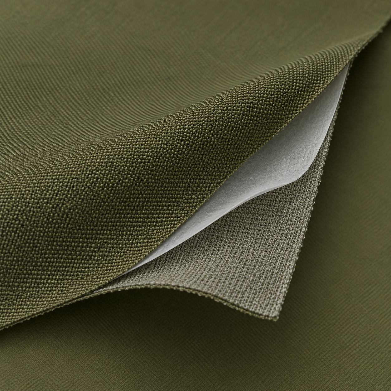 Illustrative waterproof breathable laminate — not an actual GORE-TEX sample